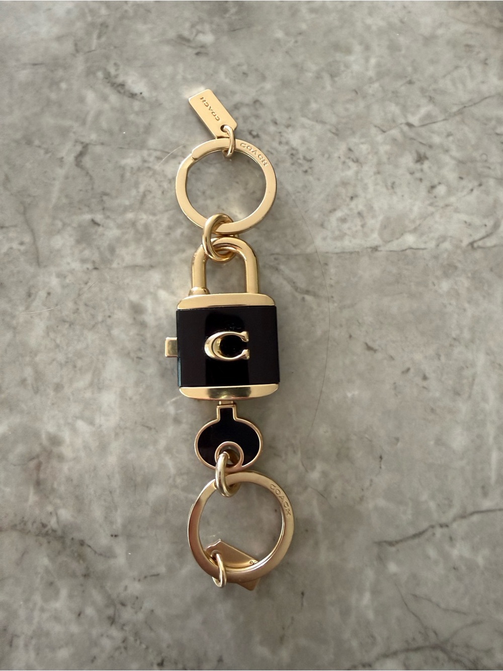 Coach Black and Gold Padlock Key Chain
